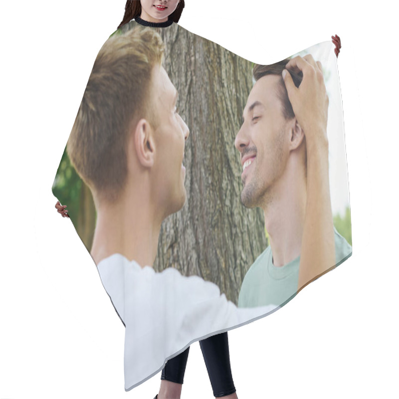 Personality  Two Joyful Men Embrace While Sharing A Heartfelt Smile In A Vibrant Outdoor Setting. Hair Cutting Cape