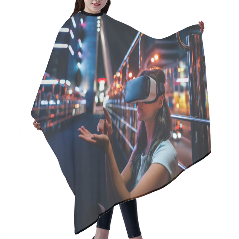 Personality  Young Woman In Virtual Reality Headset Sitting On Street With Night City On Background Hair Cutting Cape