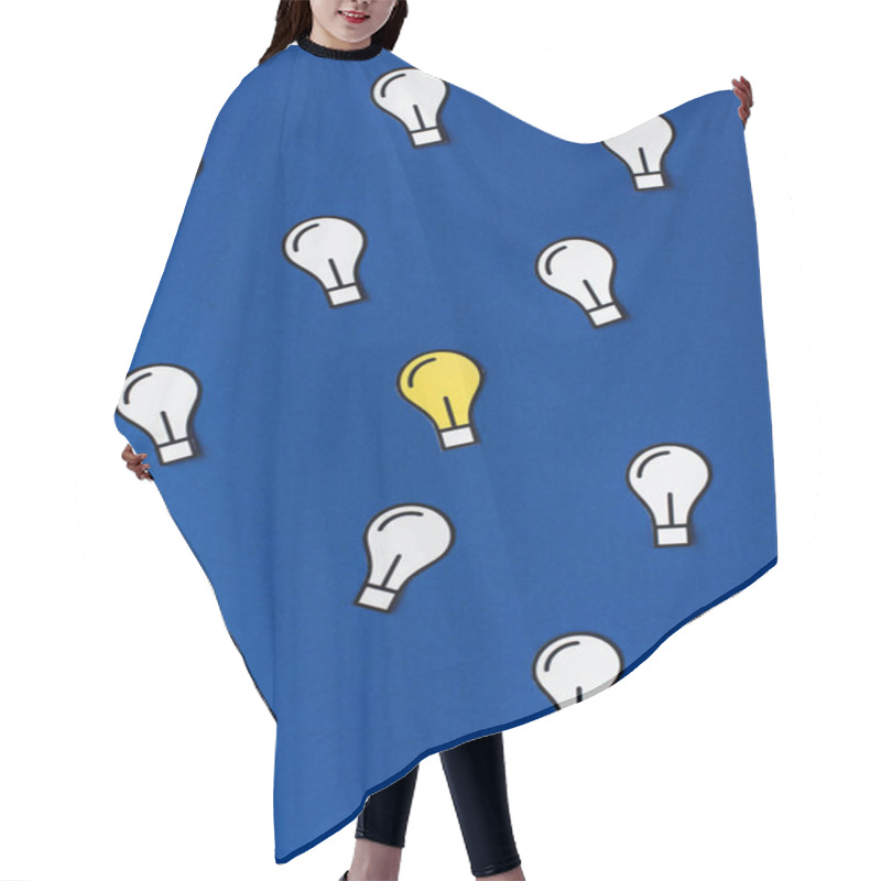 Personality  Top View Of Paper Light Bulbs On Blue Background, Business Concept Hair Cutting Cape