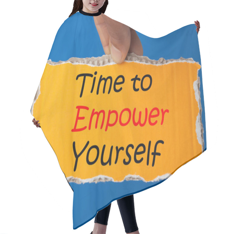 Personality  Man Is Holding A Piece Of Torn Paper With Text Time To Empower Yourself Message On Blue Backgrounds. Hair Cutting Cape