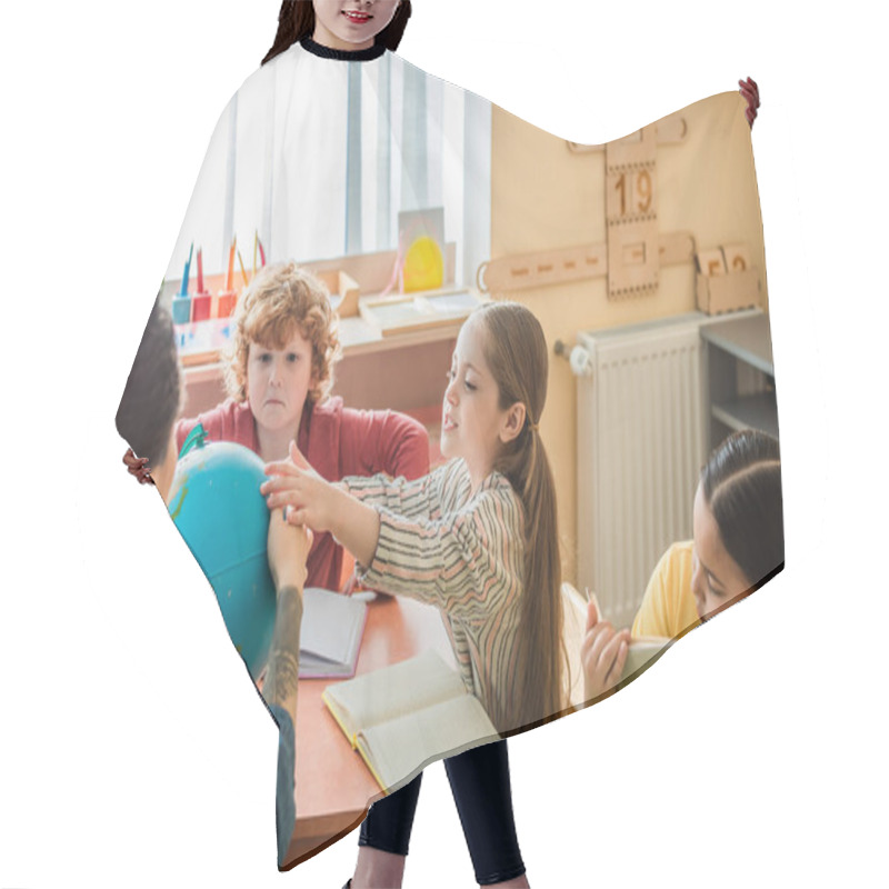 Personality  Girl Touching Globe Near Teacher And Multiethnic Kids In Montessori School Hair Cutting Cape