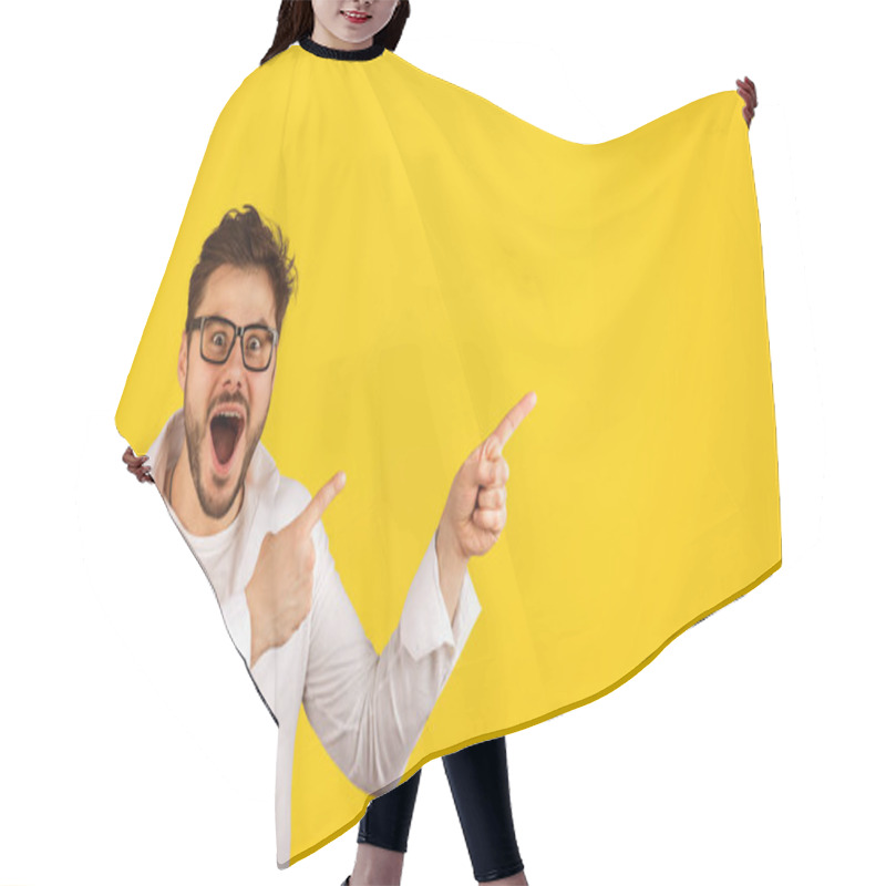 Personality  Stylish Bearded Man In Shirt And Glasses Pointing Away With Amazement While Showing New Offer On Yellow Background Hair Cutting Cape