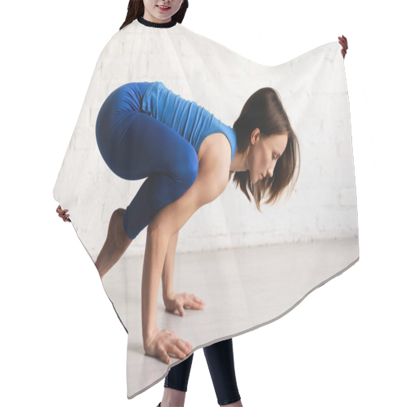 Personality  Side View Of Flexible Woman In Blue Sportswear Doing Crow Pose Hair Cutting Cape