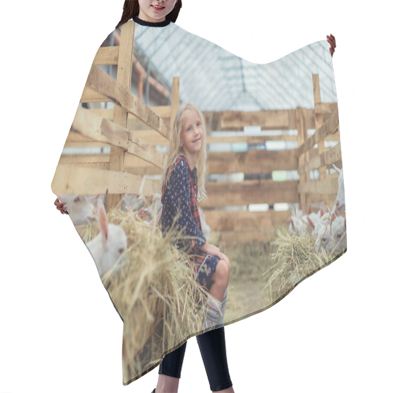 Personality  Smiling Kid Sitting In Barn With Goats Hair Cutting Cape