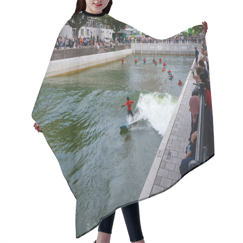 Personality  09.08.2024, Rotterdam, Blaak, Netherlands. Urban Wave Pool Named RiF010, Is Located In The Heart Of Rotterdam, For All Surf Skill Levels, From Beginners To Experienced Surfers Hair Cutting Cape