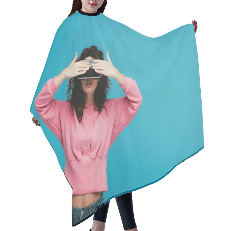 Personality  Curly Girl Wearing Virtual Reality Headset While Covering Eyes On Blue  Hair Cutting Cape