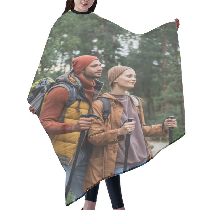 Personality  Pleased Young Couple With Backpacks Trekking Together With Hiking Sticks  Hair Cutting Cape