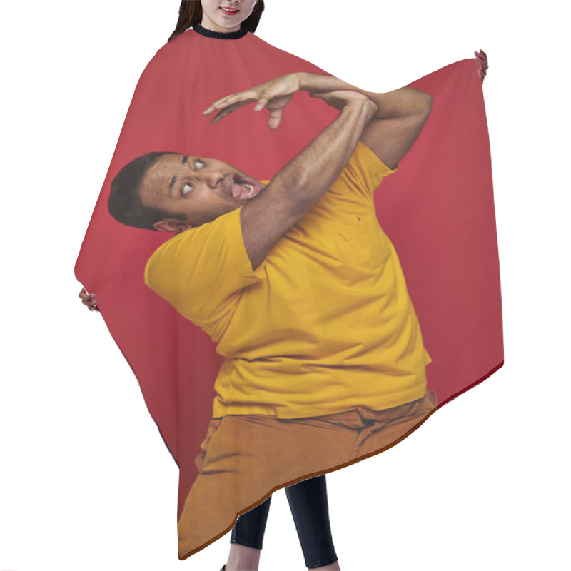 Personality  Face Expression, Hand On Shocked Indian Man In Yellow T-shirt Attacking Him On Red Background Hair Cutting Cape