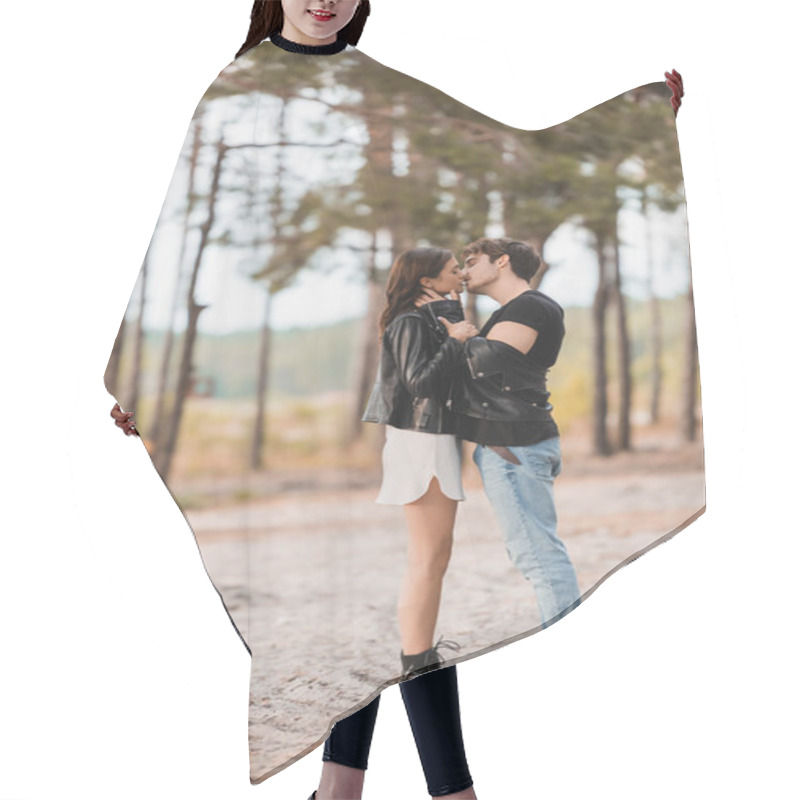 Personality  Side View Of Man In Leather Jacket Kissing Brunette Girlfriend On Sand In Forest  Hair Cutting Cape