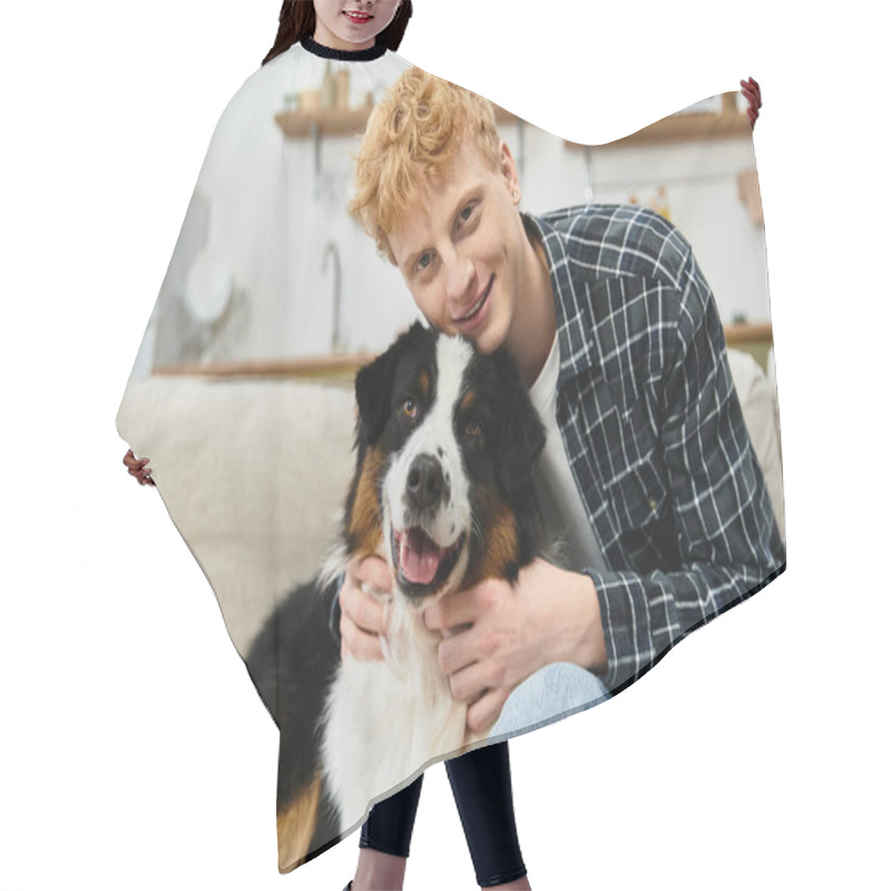 Personality  A Young Redhead Enjoys Playful Moments With His Aussie Shepherd In Their Modern Apartment. Hair Cutting Cape