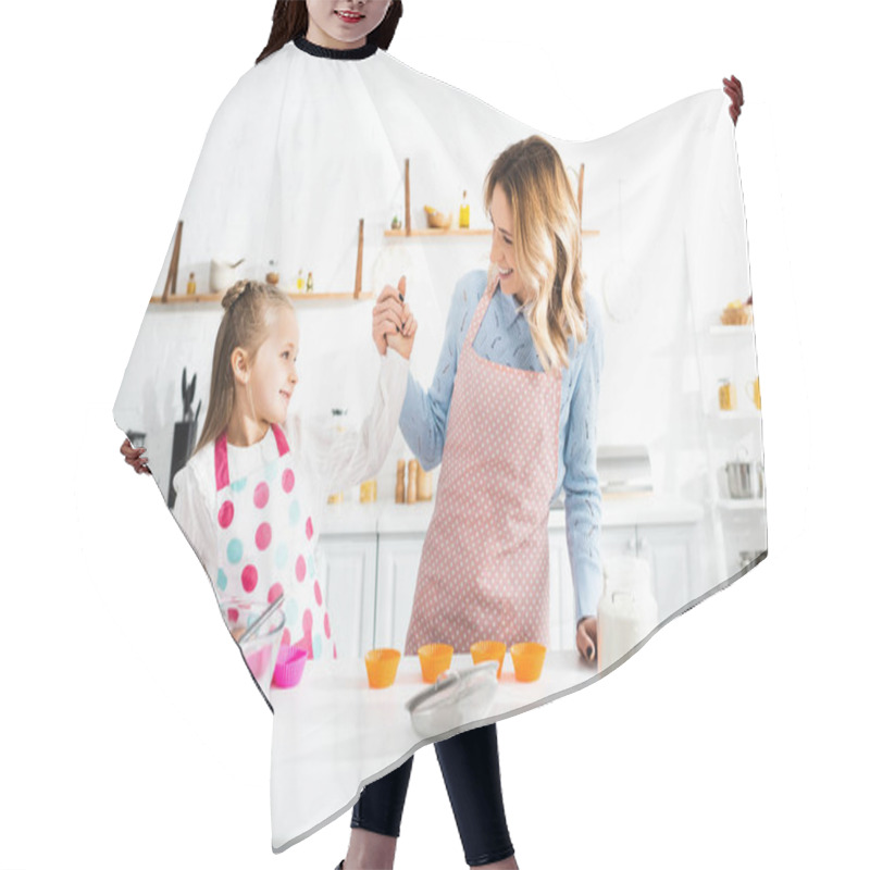 Personality  Smiling Mother Holding Hands With Cute Daughter In Kitchen  Hair Cutting Cape