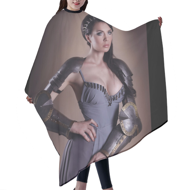 Personality  Portrait Of A Beautiful Lady Warrior, Dark-haired Girl In A Gray Hair Cutting Cape