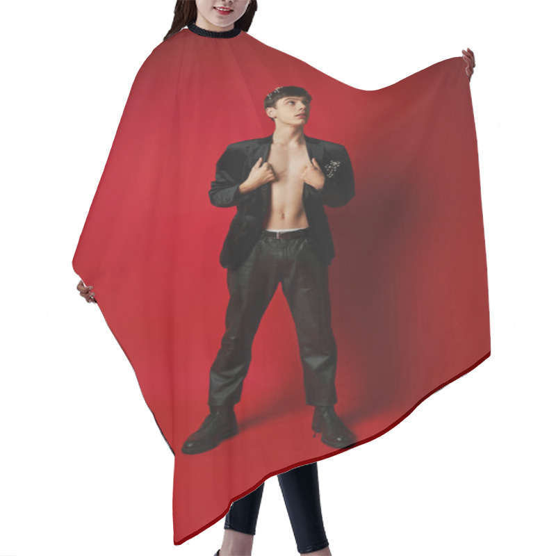 Personality  Full Length Of Young Dreamy Man With Flowers In Hair Looking Up And Standing On Red Background Hair Cutting Cape