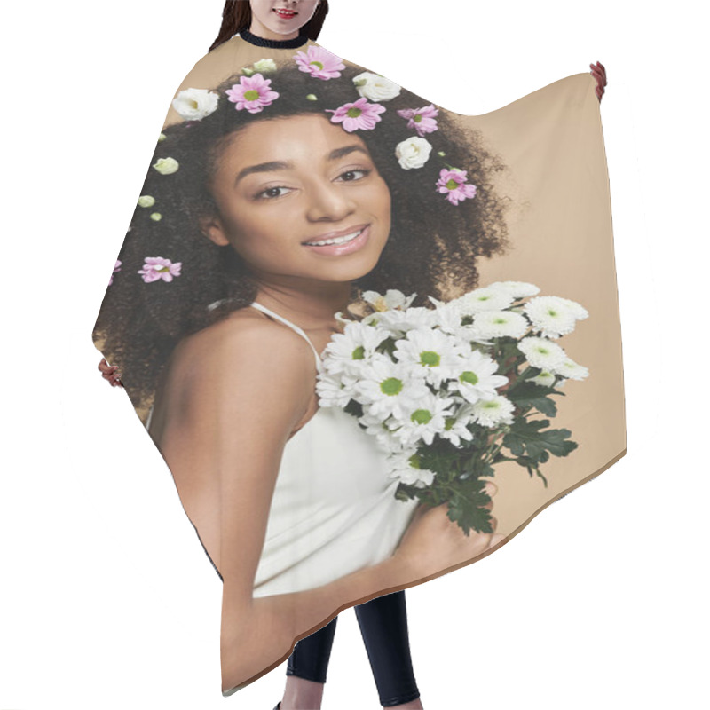 Personality  A Beautiful African American Woman With Natural Makeup Smiles While Wearing Flowers In Her Hair And Holding A Bouquet Of White Flowers. Hair Cutting Cape