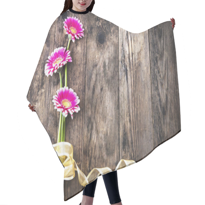 Personality  Gerbera And Gold Ribbon On The Old Board. Hair Cutting Cape