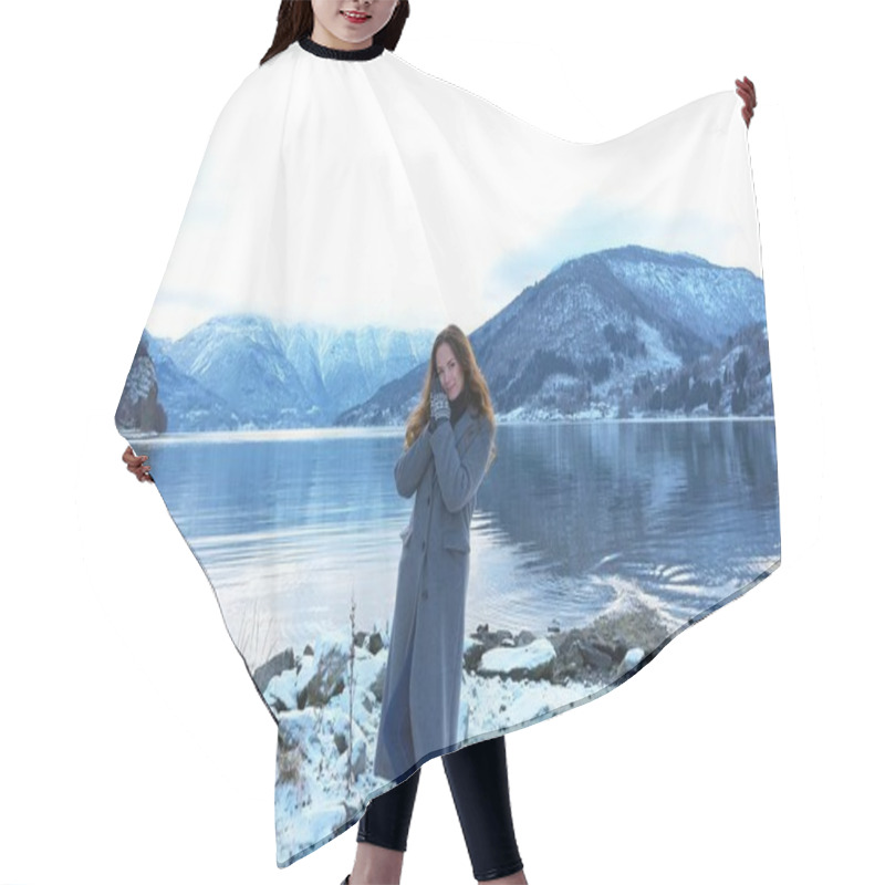 Personality  Young Woman Standing By A Serene Snow-covered Lake In Gaupne, Norway, Surrounded By Mountains, Enjoying The Peaceful Winter Landscape Hair Cutting Cape