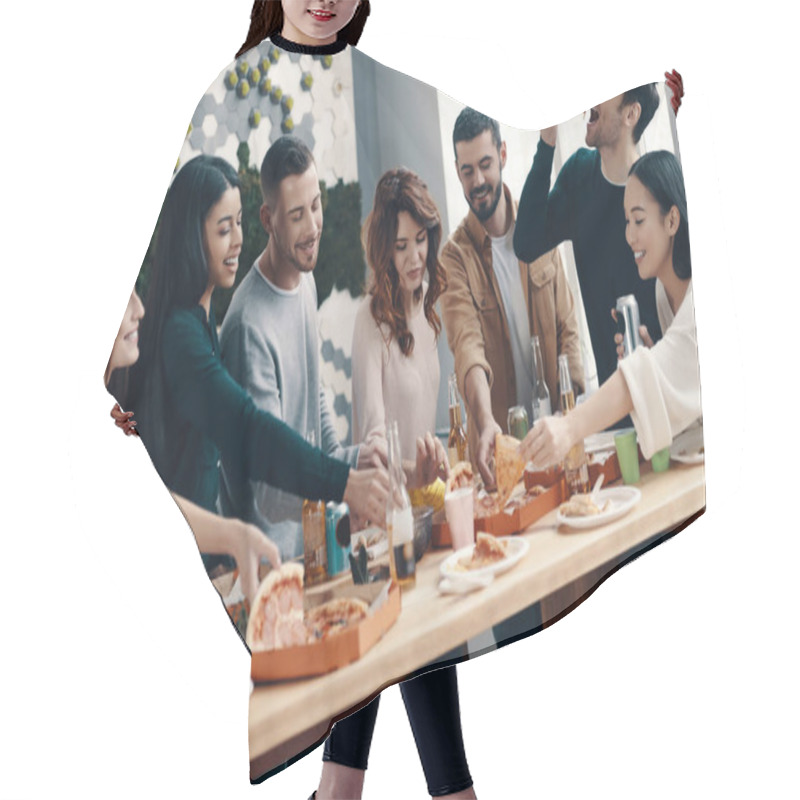 Personality  Life Is Better With Friends. Group Of Young People In Casual Wear Eating Pizza And Smiling While Having A Dinner Party Indoors   Hair Cutting Cape