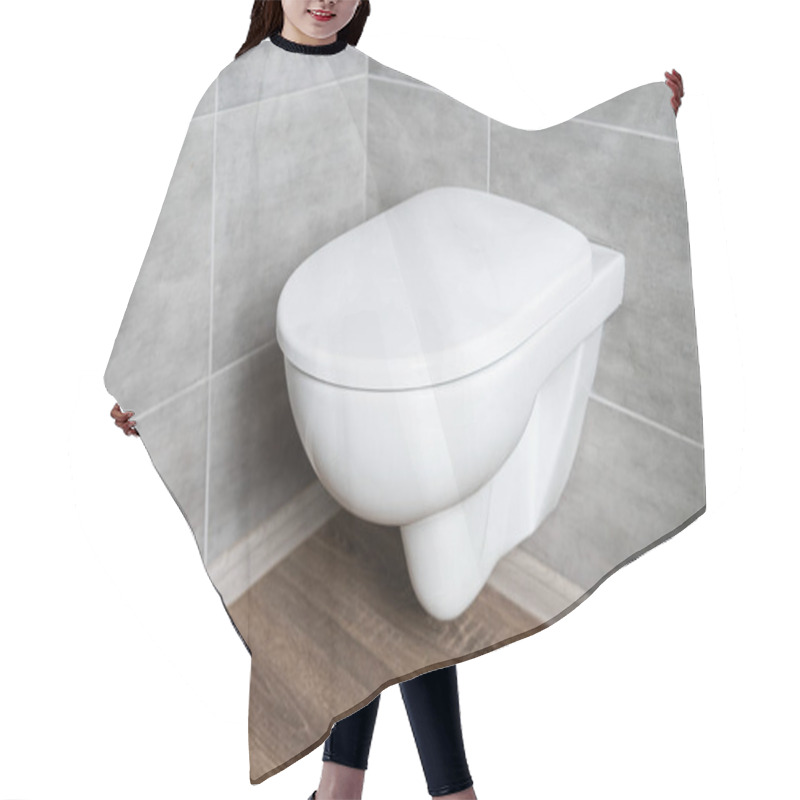 Personality  Clean White Toilet Bowl In Restroom With Grey Tile Hair Cutting Cape