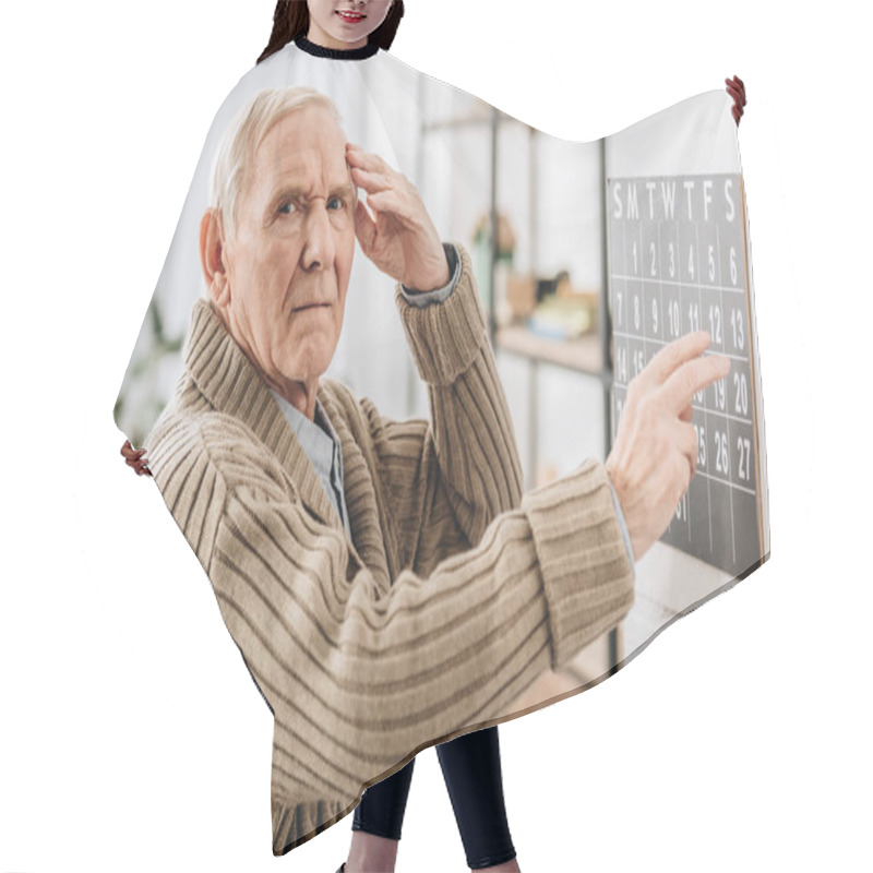 Personality  Senior Man Touching Wall Calendar And Head While Looking At Camera Hair Cutting Cape