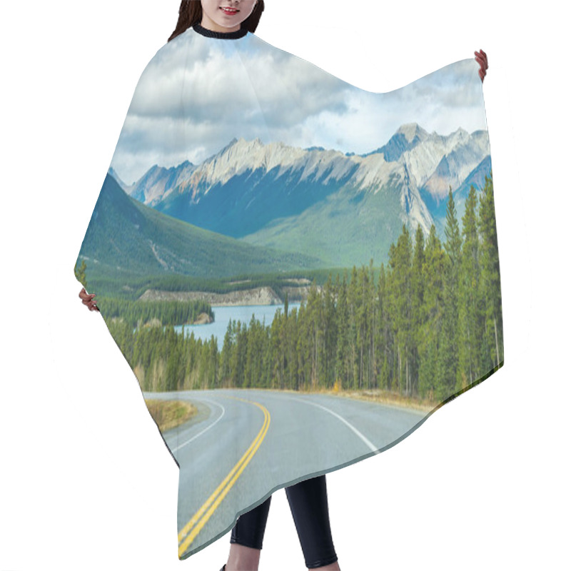 Personality  Rural Road In The Forest With Mountains In The Background. Alberta Highway 11 (David Thompson Hwy) Along The Abraham Lake Shore. Jasper National Park, Canada. Hair Cutting Cape