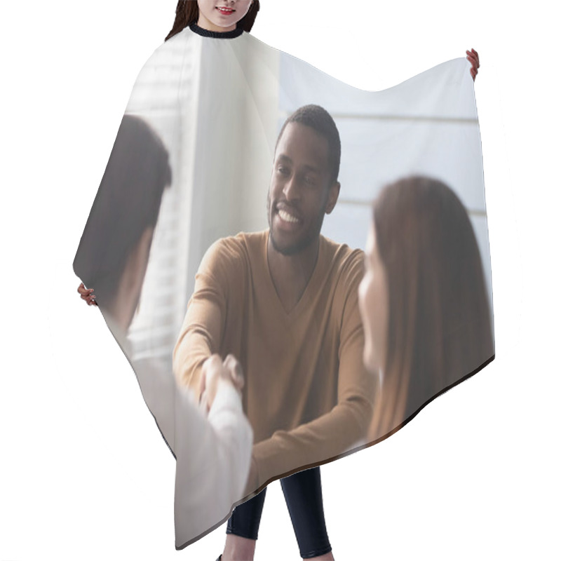 Personality  Smiling African American Candidate Shaking Hands With Businessman Recruiter. Hair Cutting Cape