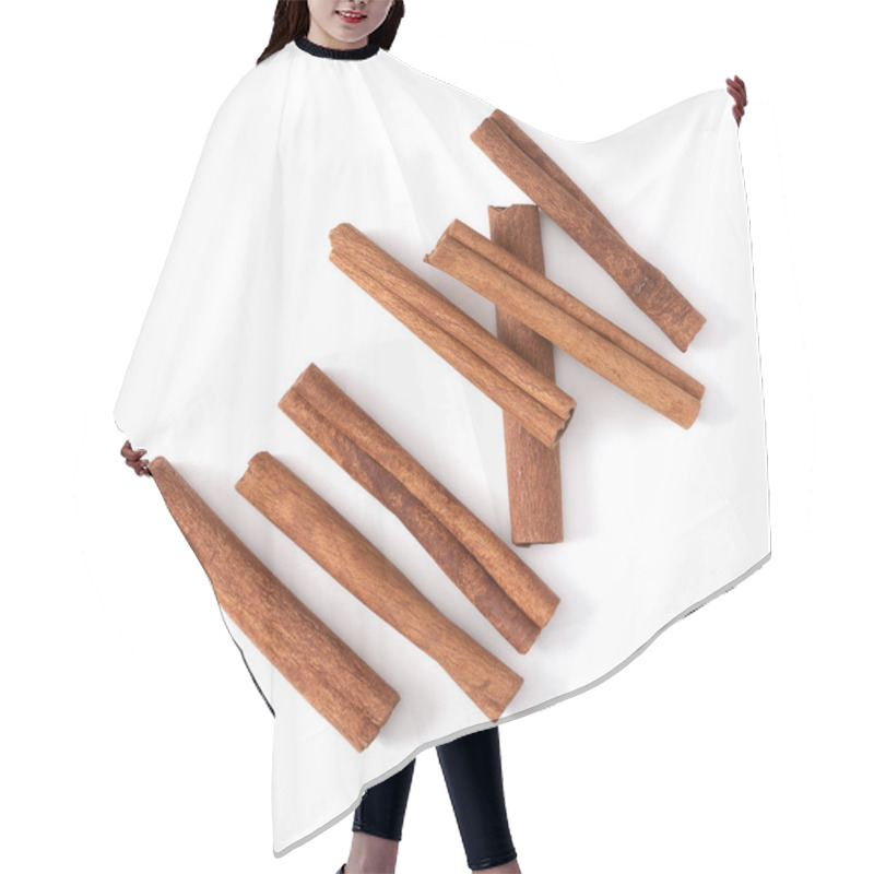 Personality  Cinnamon Sticks Isolated Over White Background Closeup. Canella  Hair Cutting Cape