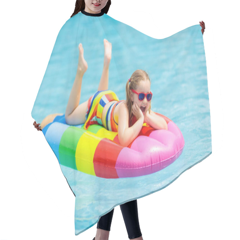 Personality  Child On Inflatable Float In Swimming Pool.  Hair Cutting Cape