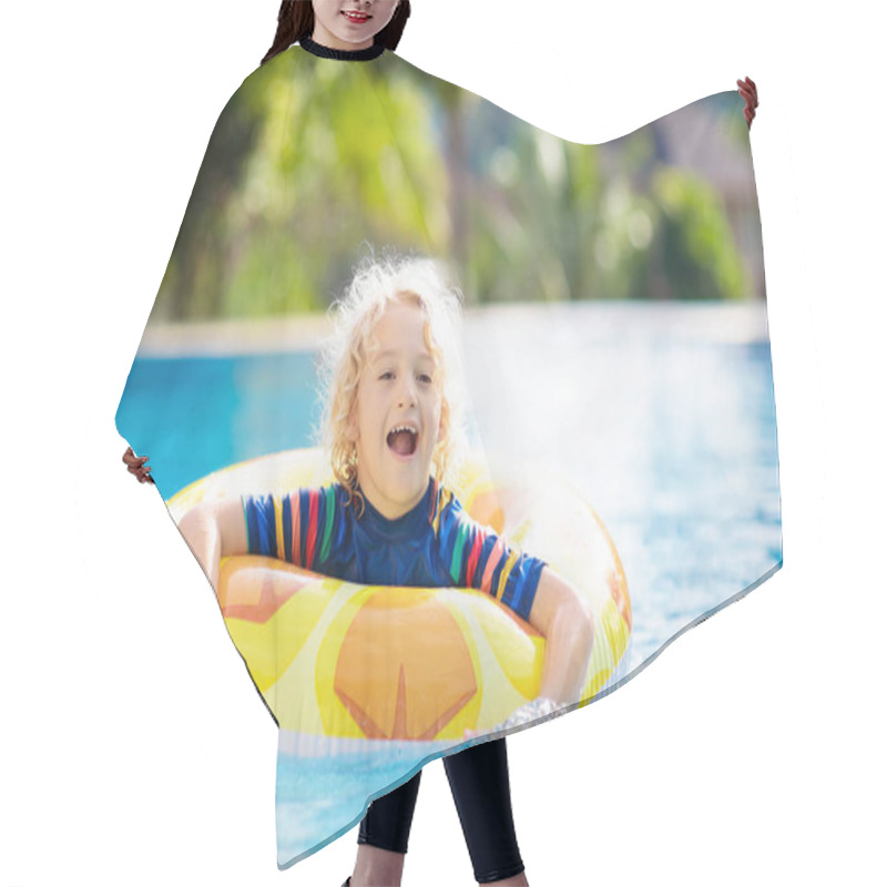 Personality  Child With Inflatable Toy Ring Float In Swimming Pool. Little Boy Learning To Swim And Dive In Outdoor Pool Of Tropical Resort. Swimming With Kids. Healthy Sport Activity For Children. Water Fun. Hair Cutting Cape