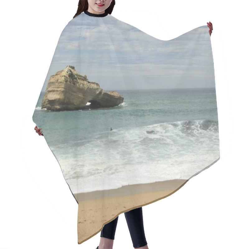 Personality  Single Person Bathing In Overcast Day At A Beach In Biarritz, France With Rocky Sea Stack And Gentle Waves. High Quality Photo Hair Cutting Cape