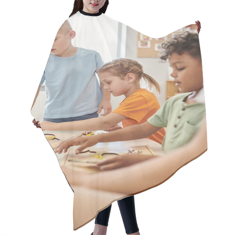 Personality  Multiethnic Kids And Teacher Using Didactic Materials During Lesson In Montessori School Hair Cutting Cape