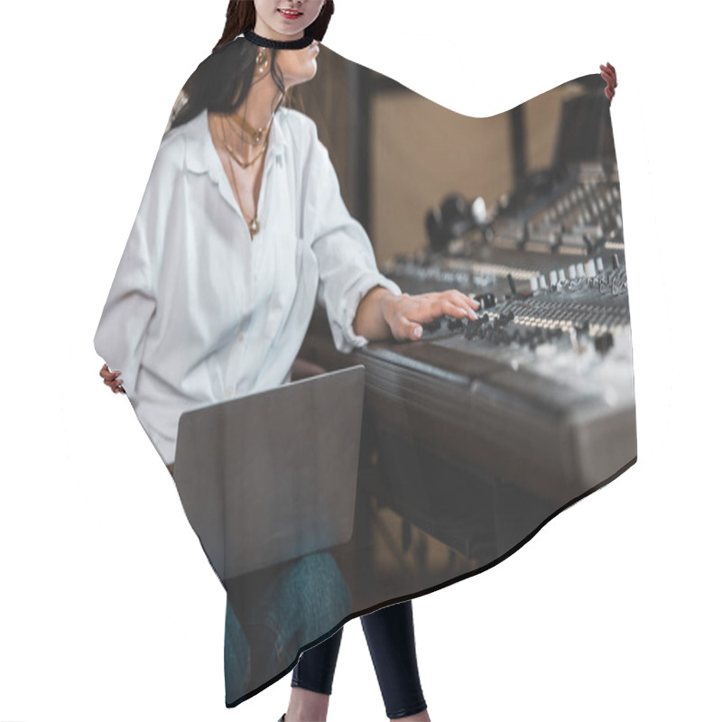 Personality  Cropped View Of Sound Producer Working At Mixing Console And Using Laptop  Hair Cutting Cape