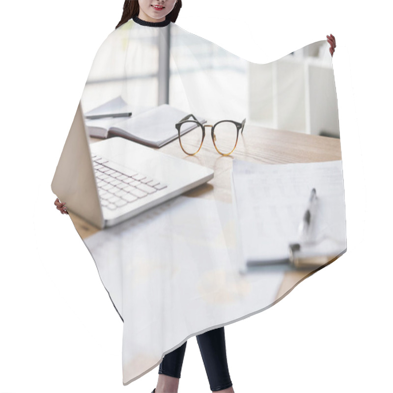 Personality  Image Of Workplace In Office Room Without People With Open Laptop, Clipboard, Glasses Pencil And Notebook Lying On Wooden Desk Hair Cutting Cape