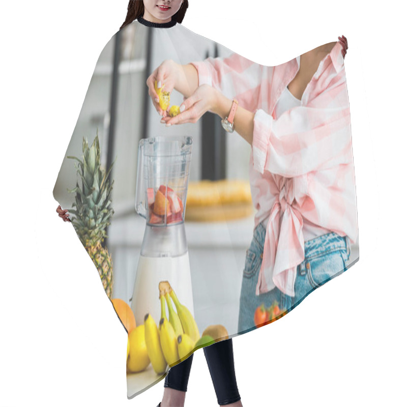 Personality  Cropped View Of Young Woman Adding Ingredients In Blender  Near Fruits Hair Cutting Cape