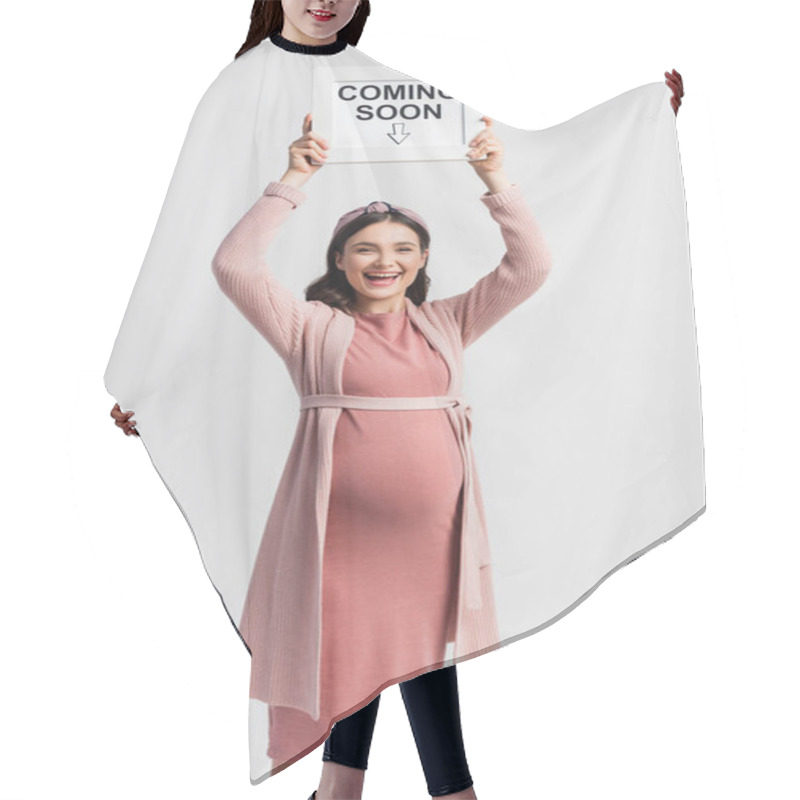 Personality  Excited And Pregnant Woman Holding Board With Coming Soon Lettering Isolated On White Hair Cutting Cape