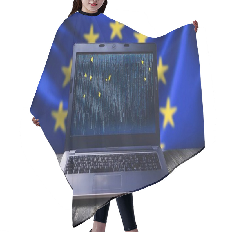 Personality  A Laptop Displaying Code Sits On A Case Against A Backdrop Of The European Union Flag. Hair Cutting Cape