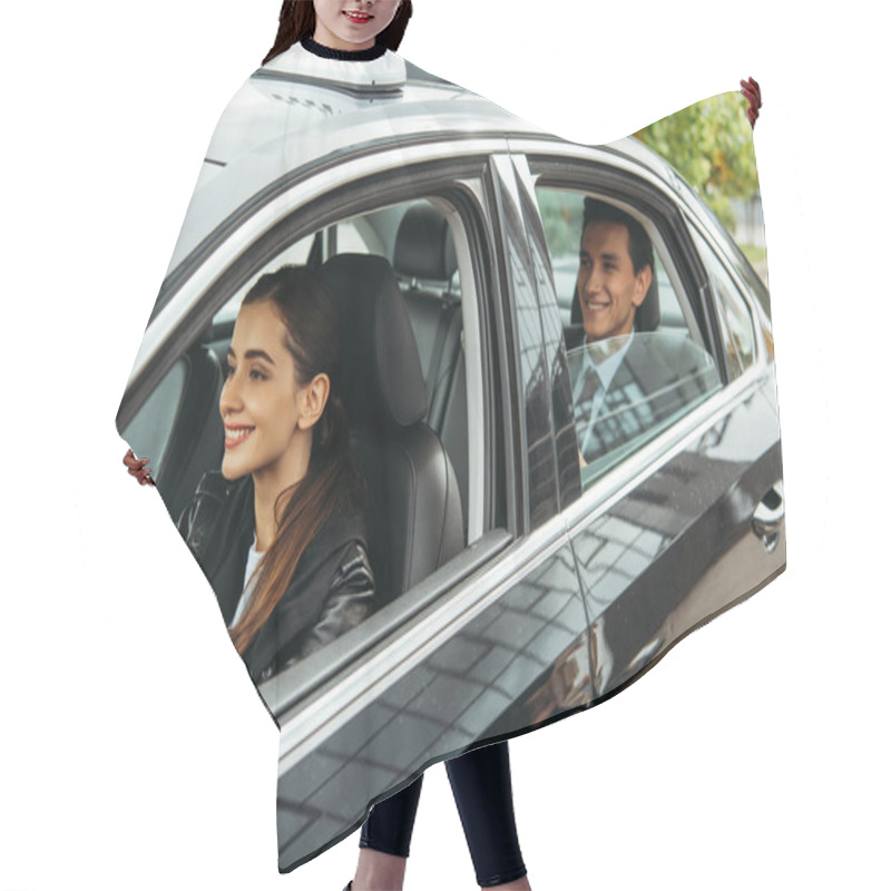 Personality  Smiling Female Taxi Driver And Businessman In Car Hair Cutting Cape