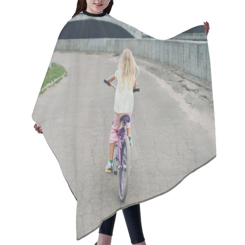 Personality  Back View Of Blond Child Riding Bicycle On Street Hair Cutting Cape