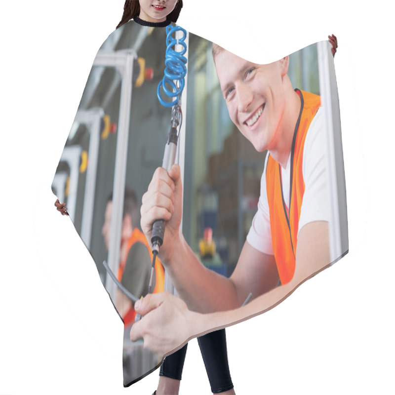 Personality  Young Smiling Man Working On The Production Line Hair Cutting Cape