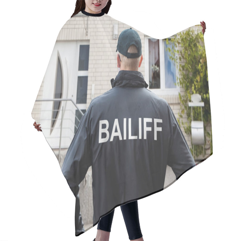 Personality  Rear View Of A Male Bailiff Standing With His Hands On Hips At House Entrance Hair Cutting Cape