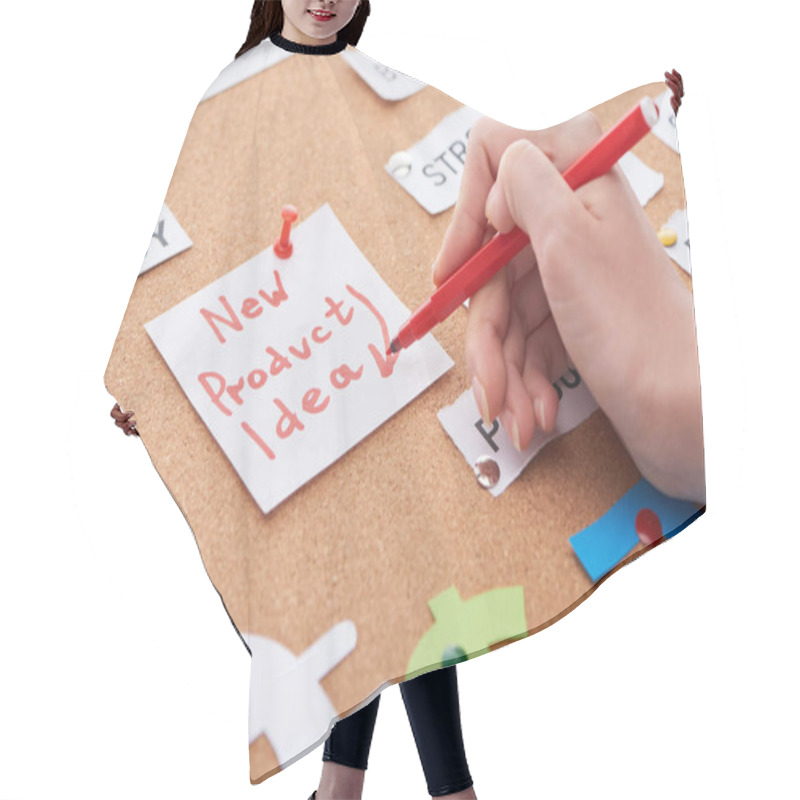 Personality  Cropped View Of Woman Holding Red Felt-tip Pen Near Card With New Product Idea Inscription On Cork Board Hair Cutting Cape