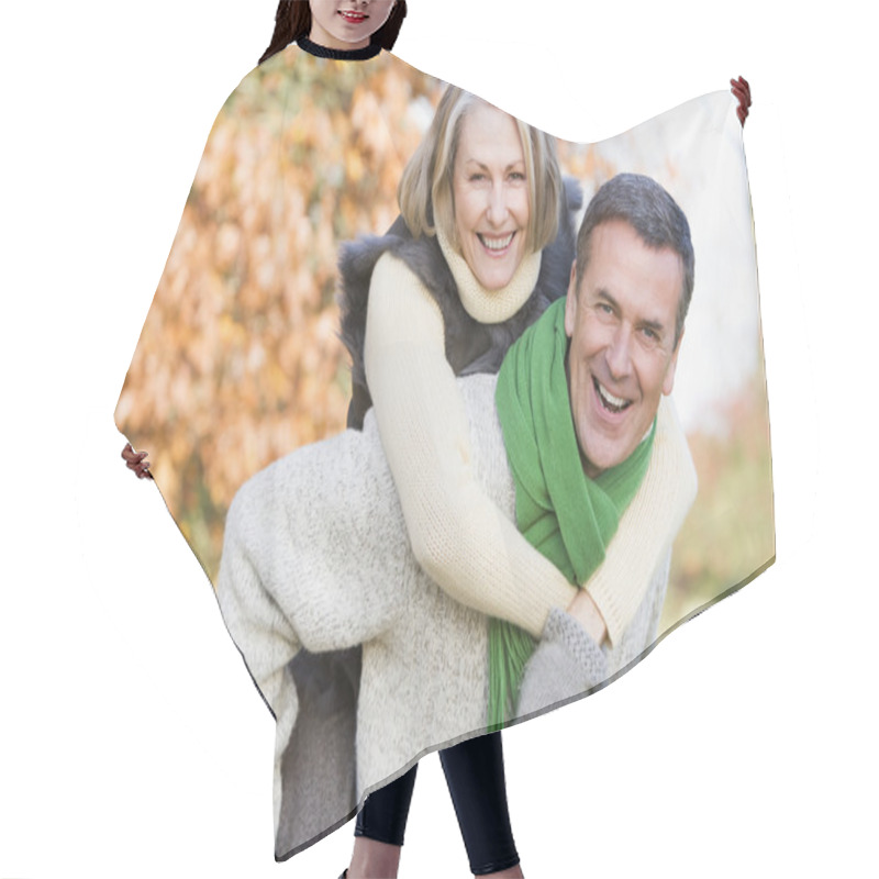 Personality  Senior Man Giving Woman Piggyback Ride Hair Cutting Cape