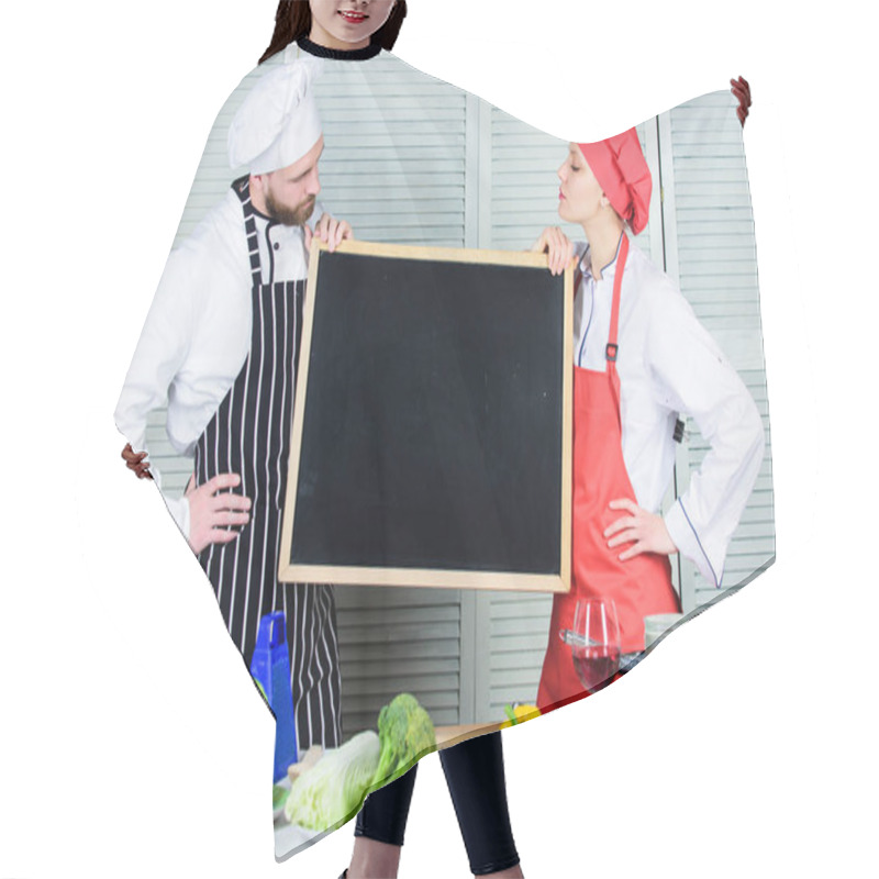 Personality  Teaching Different Cooking Techniques. Couple Of Man And Woman Holding Board In Cooking School. Master Cook And Prep Cook Giving Cooking Class. Chef And Cook Helper Teaching Master Class, Copy Space Hair Cutting Cape