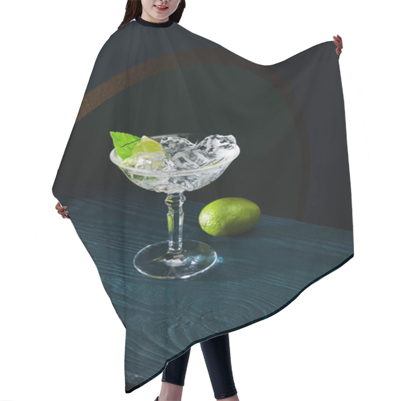 Personality  High Angle View Of Cocktail Glass With Mint Leaf And Whole Lime On Blue Wooden Surface On Geometric Background Hair Cutting Cape