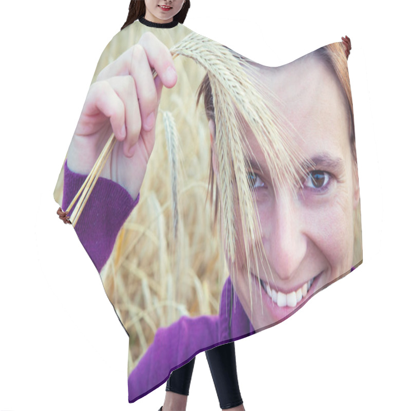 Personality  Young Girl Smiling With Ear In Her Hand, On A Wheet Field Hair Cutting Cape