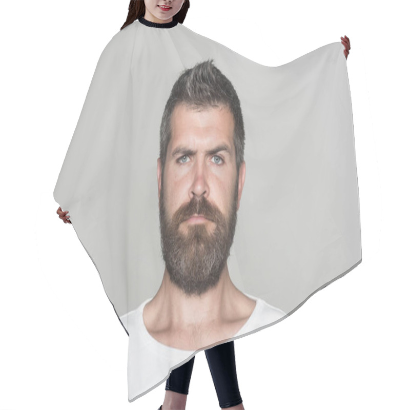 Personality  Guy Or Bearded Man On Grey Background. Hair Cutting Cape