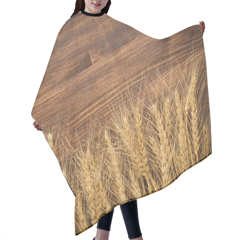 Personality  Wheat On Wooden Background. Top View Hair Cutting Cape