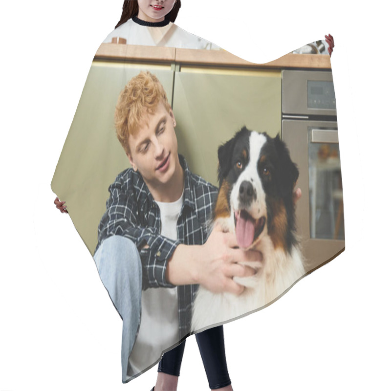 Personality  A Young Redhead Man Has Fun With His Playful Australian Shepherd In Their Apartment. Hair Cutting Cape