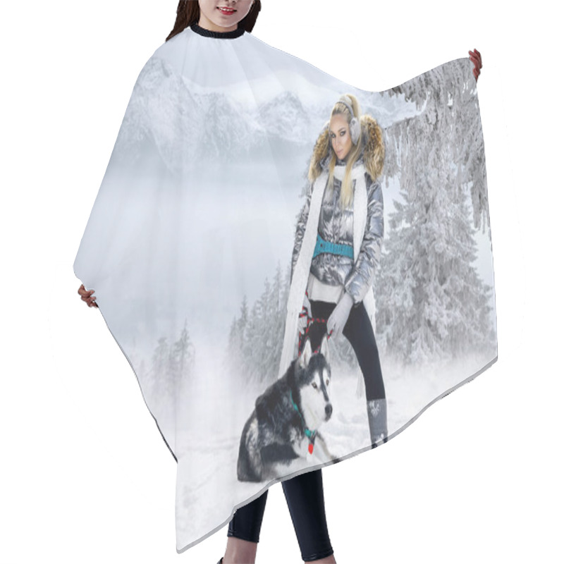 Personality  Beautiful Blonde Woman, Standing On Snow And Holding Husky Dogs. In The Background Is A Beautiful View Of Mountains And Snow. Hair Cutting Cape