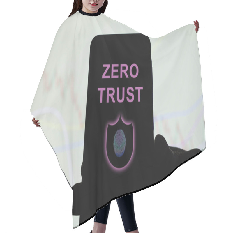 Personality  Engineer Using A Zero Trust Security Tool On A Phone Hair Cutting Cape