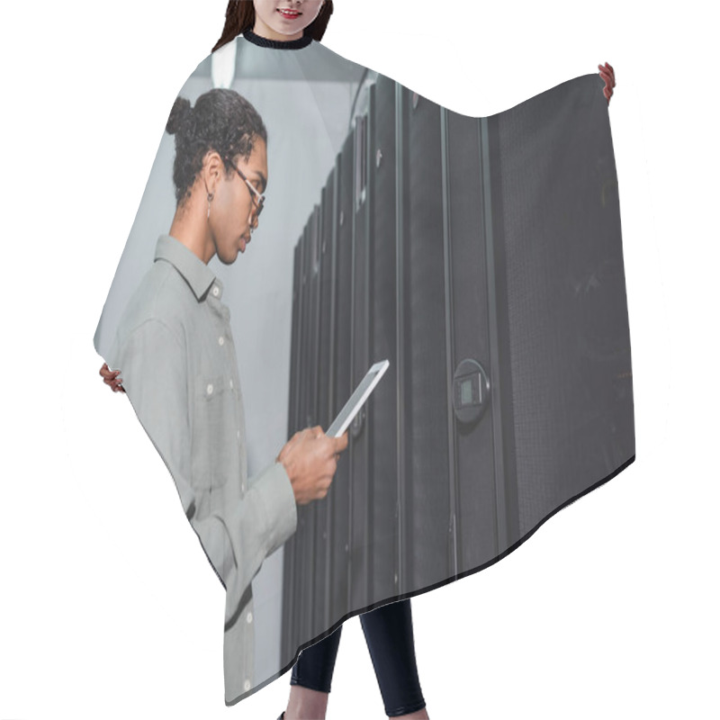 Personality  Side View Of African American Programmer With Digital Tablet Standing Near Servers In Data Center Hair Cutting Cape